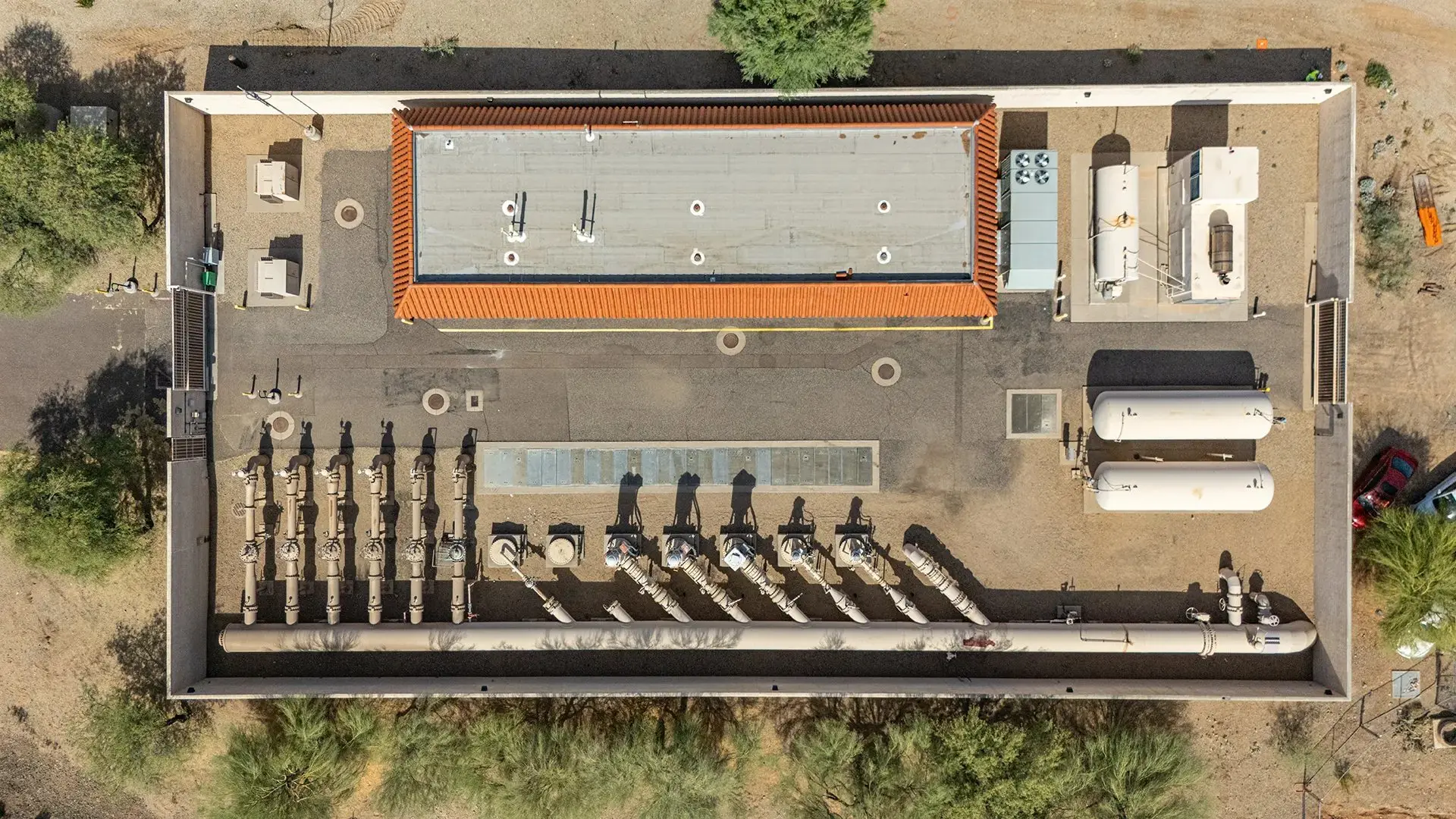 Straight-down drone view of a commercial building and equipment yard in Phoenix